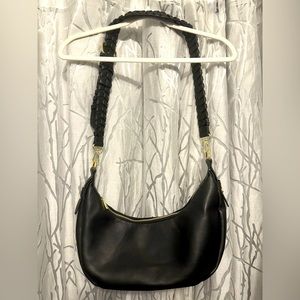 Jules Kae unique moon-shaped Zola bag is buttery soft vegan leather crossbody